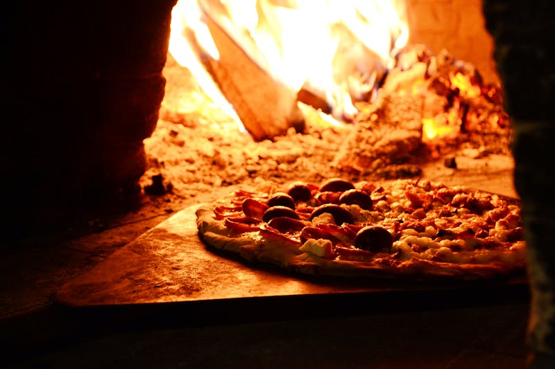 Dewey's spicy Italian sausage and roasted pepper specialty pizza